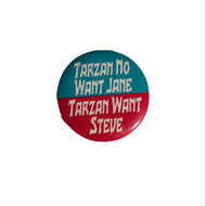 Button badge with 'Tarzan No Want Jane, Tarzan Want Steve' text on a white background