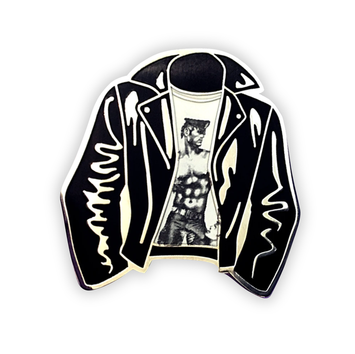 Enamel pin of a leather jacket with a white shirt with art of a shirtless man in black jeans and a conductor hat by Tom of Finland underneath