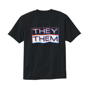 A picture of a black t-shirt with a large rectangle that has text that reads "THEY THEM" in white, red, and blue to create a 3D effect. 