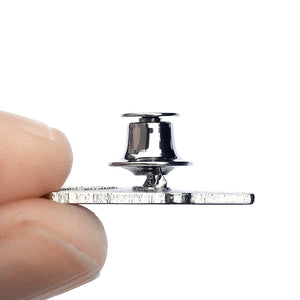 Picture showing the silver locking pin back on the back of an enamel pin. 