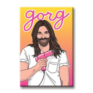Illustration of Jonathan Van Ness in a white t-shirt holding a pink blow dryer in front of a ombre yellow to pink background with "gorg" in pink along the top. 