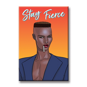 Illustration of Grace Jones with a short cropped haircut in a dark blue suit with a cigarette in her mouth in front of an ombre orange to yellow background with "Stay Fierce" in white across the top.