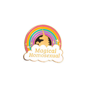 Enamel pin of a rainbow with white sparkles and a cloud at the bottom with text inside that reads "Magical Homosexual" in gold lettering. Inside the rainbow is the outline of a reared up unicorn in gold. 